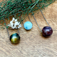 Crystal Sphere Necklaces