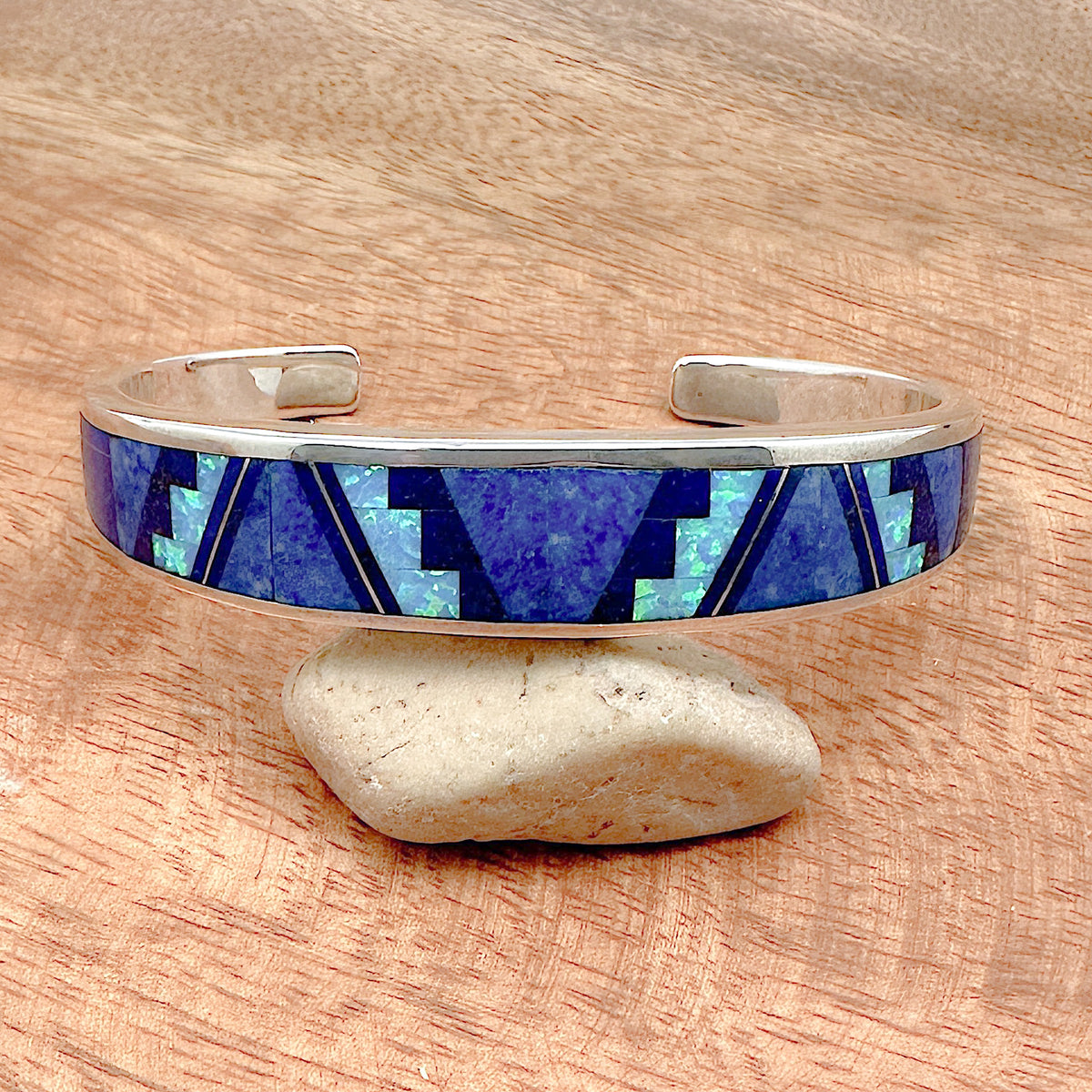 Shot of the front of a blue sky inlay cuff bracelet