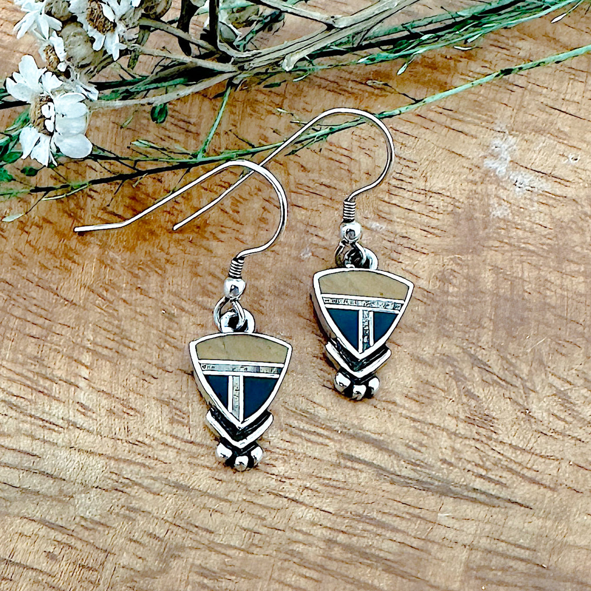 Navajo inlay earrings inlaid with Black Jade, Tiger's Eye and Black Jade. David Rosales Collection/ Super Smith