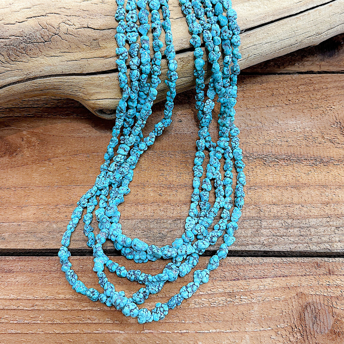 A 36" long Kingman Turquoise necklace that features natural freeform Turquoise nuggets.