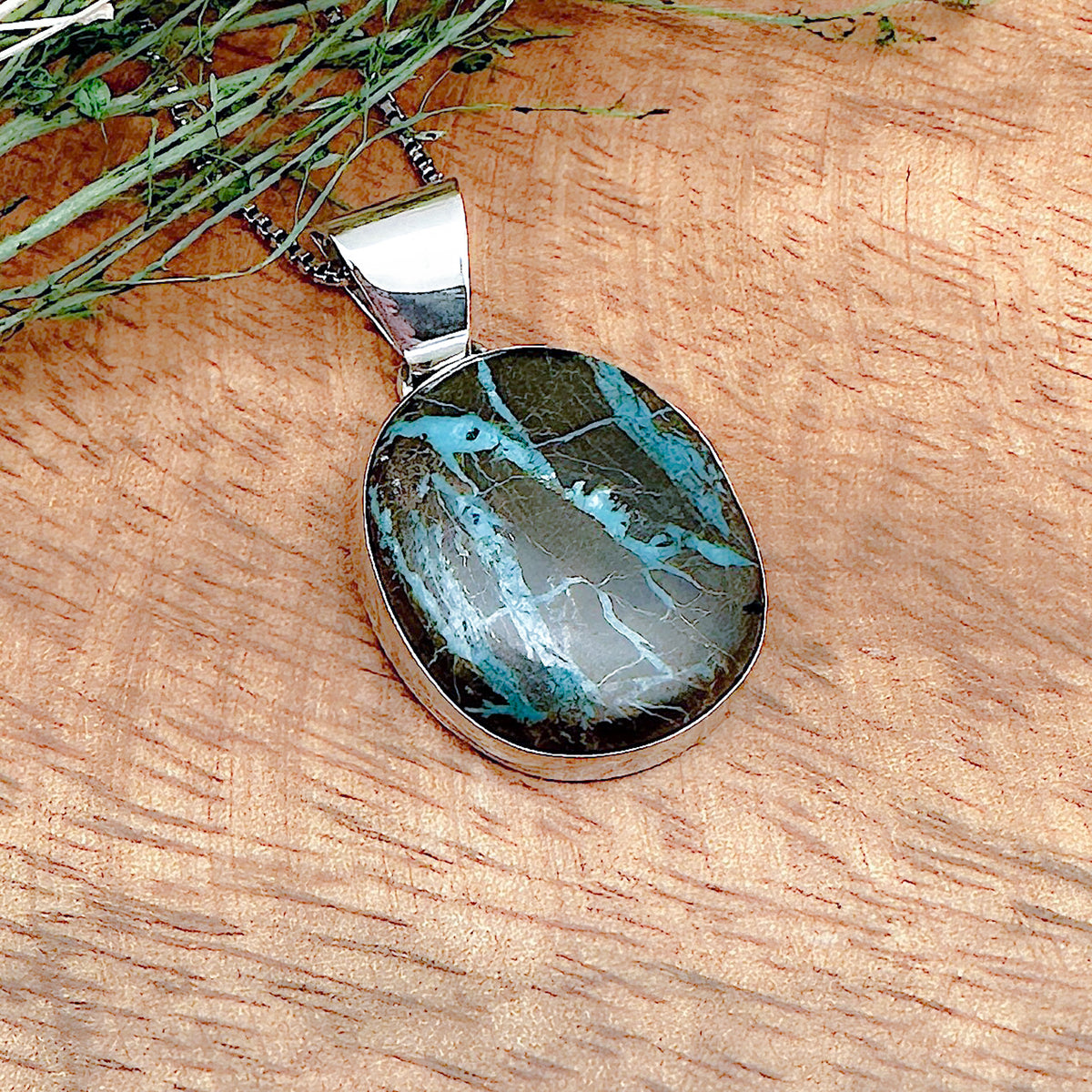 Shot of a boulder turquoise pendant